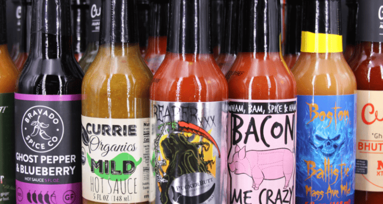 hot sauce collection including reaper squeezins,bacon me crazy and culleys sold at puckerbut